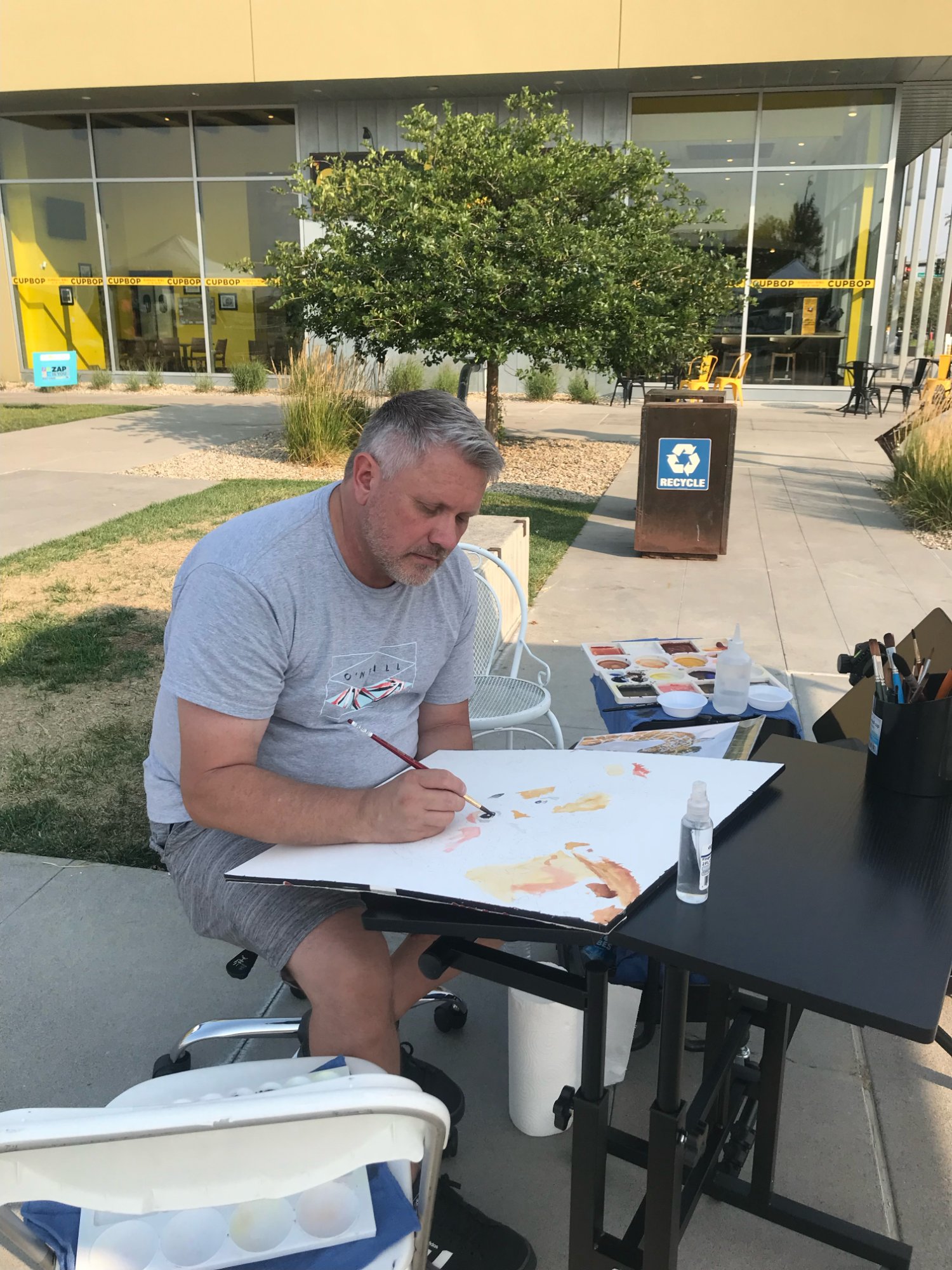 Brad Jones painting outdoors in Daybreak